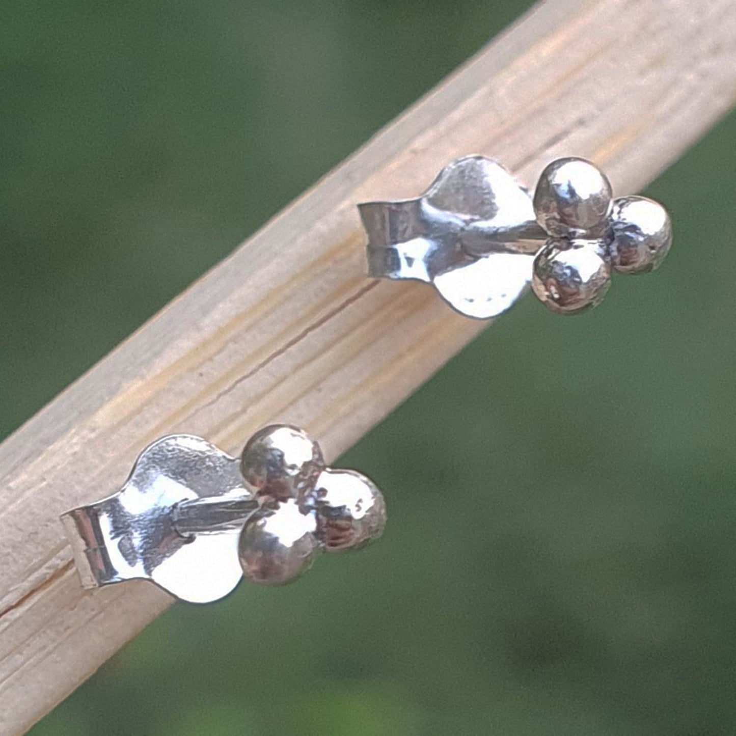 three dotted earrings